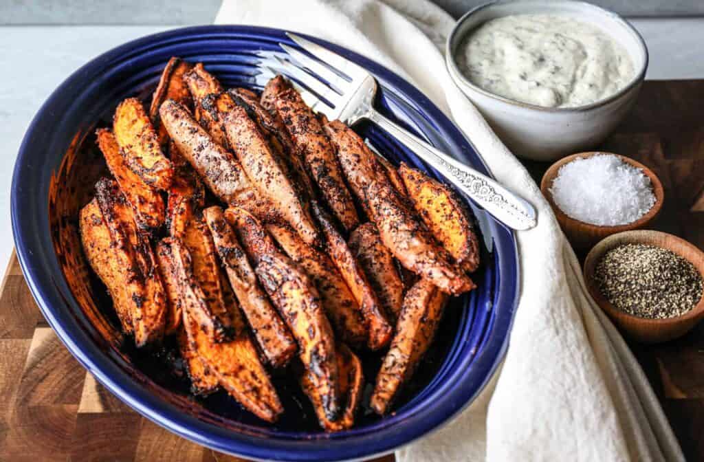 plate full of gluten free air fryer sweet potato wedges