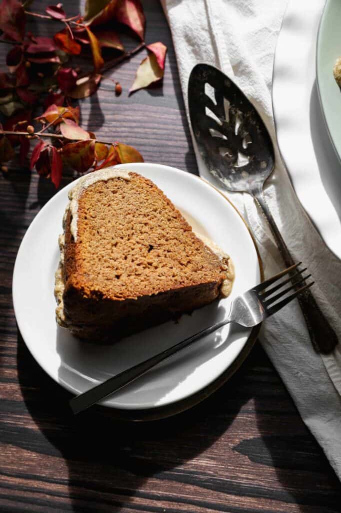 a slice of gluten free pumpkin spice bundt cake on a plate