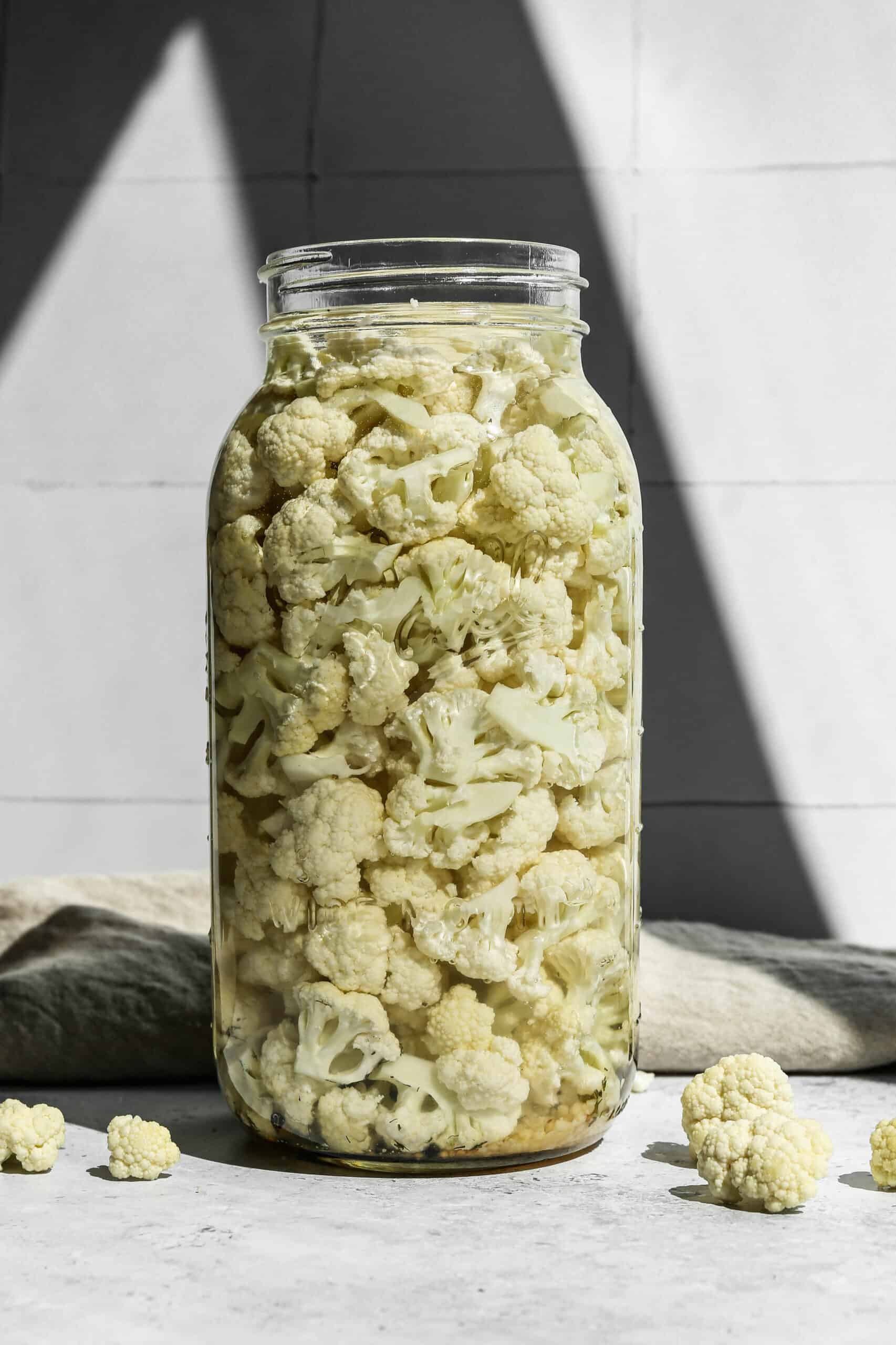 a half gallon jar of easy refrigerator pickled cauliflower.